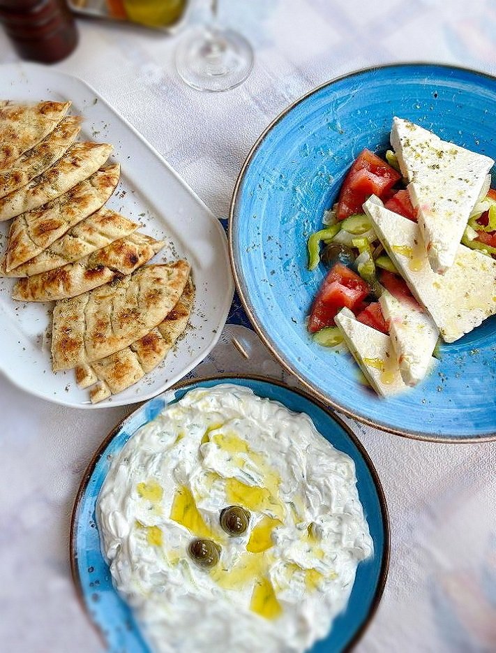 greek salad, tzatziki and pita appetizers